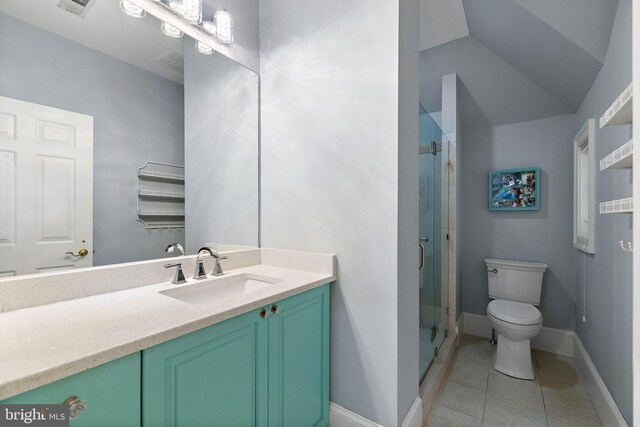 full bathroom with a stall shower, toilet, tile patterned flooring, vanity, and baseboards