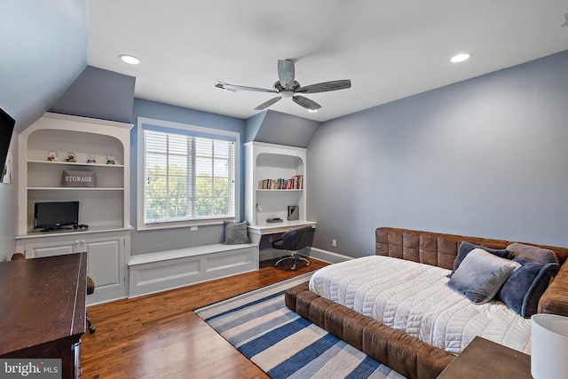 bedroom with a desk, wood finished floors, recessed lighting, a ceiling fan, and baseboards