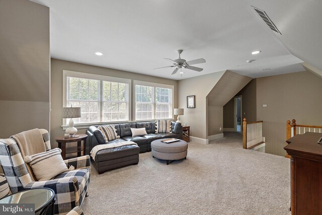 living room featuring carpet, a ceiling fan, baseboards, and recessed lighting