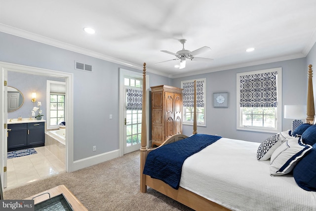 bedroom featuring multiple windows, crown molding, baseboards, recessed lighting, and connected bathroom