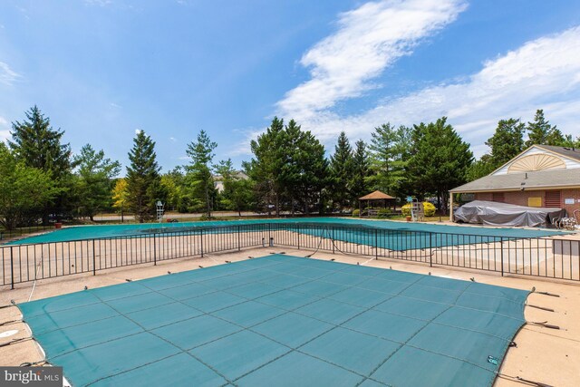 10519 Stonington Ln, Manassas, VA 20109 - view of swimming pool with fence, a fenced in pool, and a patio area