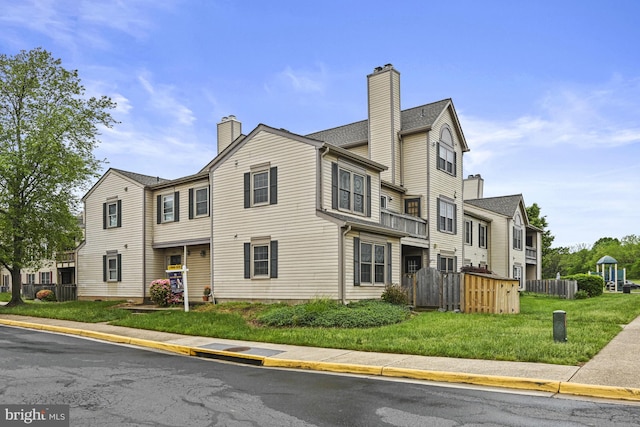 10519 Stonington Ln, Manassas, VA 20109 - exterior space featuring a chimney, a residential view, and fence