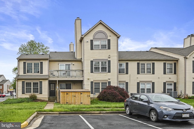 10519 Stonington Ln, Manassas, VA 20109 - exterior space with uncovered parking and a chimney