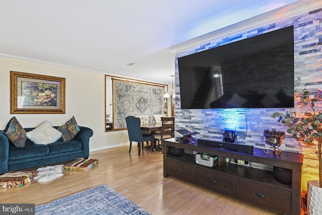 10519 Stonington Ln, Manassas, VA 20109 - living room with ornamental molding, baseboards, and light wood-type flooring