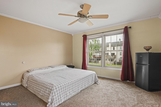 10519 Stonington Ln, Manassas, VA 20109 - bedroom with carpet, a ceiling fan, freestanding refrigerator, baseboards, and ornamental molding