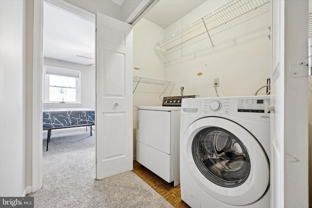 103 Debbie Ln, Phoenixville, PA 19460 - laundry area featuring carpet flooring, washing machine and dryer, and laundry area