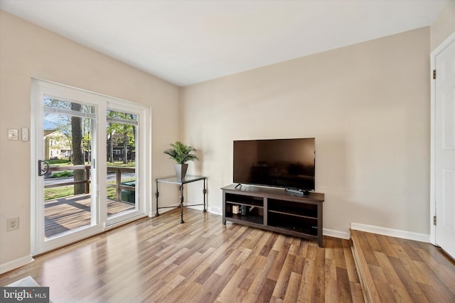 103 Debbie Ln, Phoenixville, PA 19460 - living area with baseboards and wood finished floors