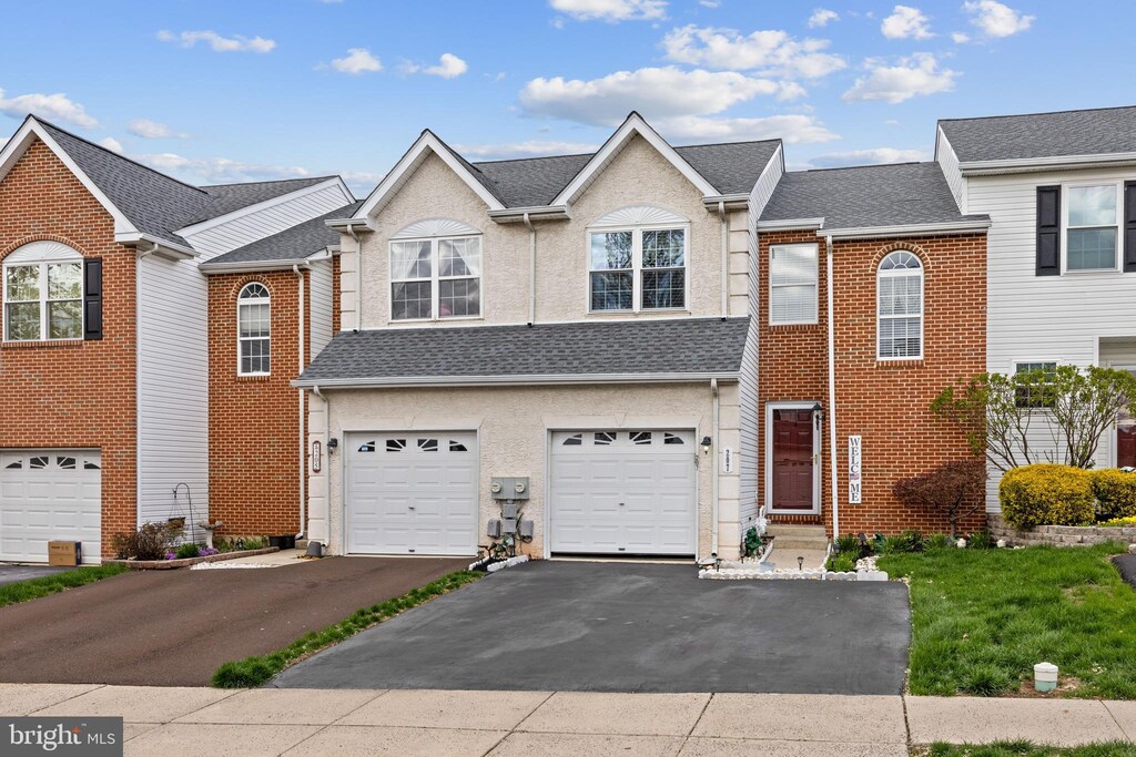 207 Hampshire Dr, Sellersville, PA 18960 - multi unit property featuring aphalt driveway and a garage