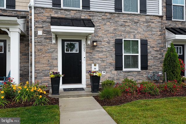 12461 Coastal Marsh Dr Unit 707, Berlin, MD 21811 - view of exterior entry with stone siding