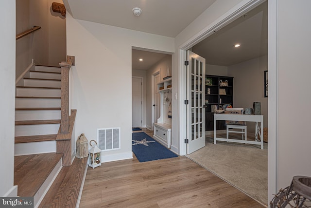 12461 Coastal Marsh Dr Unit 707, Berlin, MD 21811 - entrance foyer featuring wood finished floors, stairs, baseboards, and recessed lighting