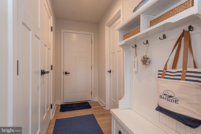 12461 Coastal Marsh Dr Unit 707, Berlin, MD 21811 - mudroom featuring light wood-style flooring and baseboards