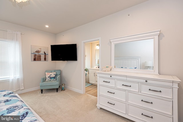 12461 Coastal Marsh Dr Unit 707, Berlin, MD 21811 - bedroom with light carpet, baseboards, ensuite bathroom, and recessed lighting