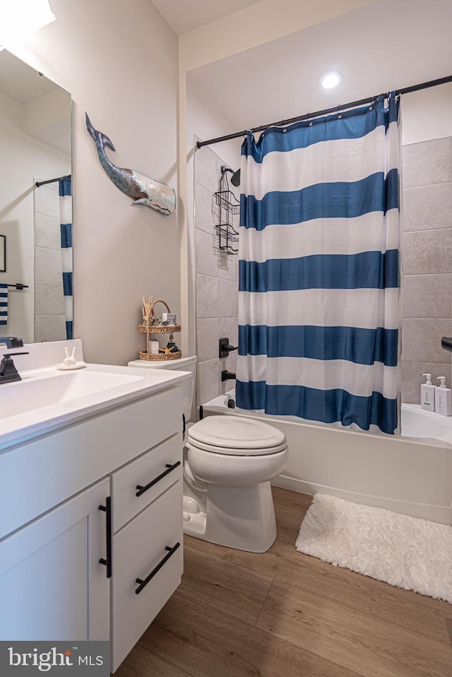 12461 Coastal Marsh Dr Unit 707, Berlin, MD 21811 - full bath with wood finished floors, vanity, shower / bath combination with curtain, and toilet