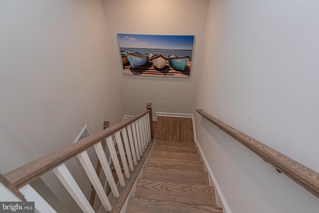 12461 Coastal Marsh Dr Unit 707, Berlin, MD 21811 - staircase featuring wood finished floors
