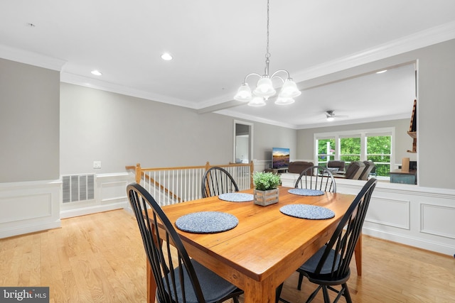 84 Battery Point Dr, Fredericksburg, VA 22406 - dining space featuring light wood-style floors, ornamental molding, a chandelier, a wainscoted wall, and recessed lighting