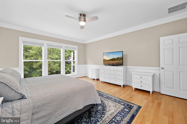 84 Battery Point Dr, Fredericksburg, VA 22406 - bedroom with crown molding, wainscoting, light wood-type flooring, and ceiling fan