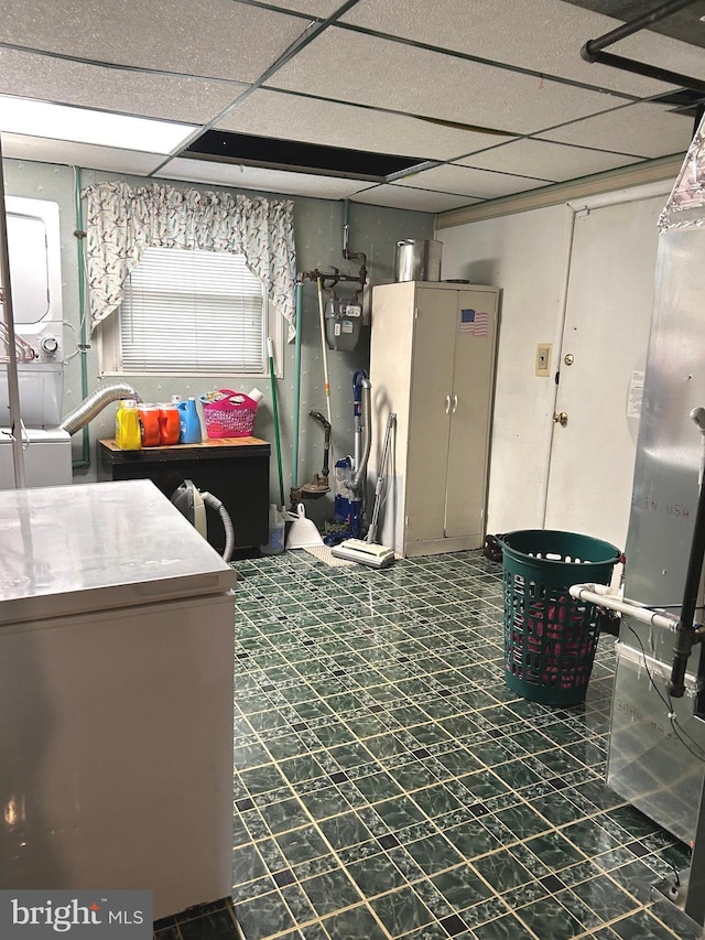 interior space with stacked washing maching and dryer