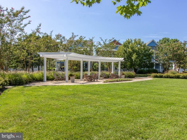 view of property's community with a pergola, a lawn, and a patio