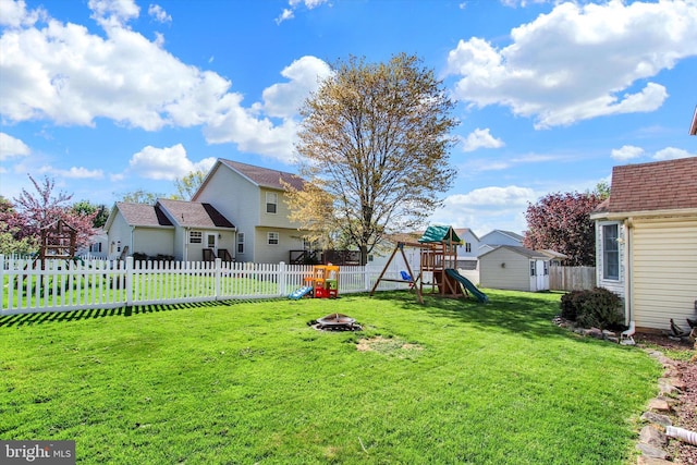 1664 Beech Ln, Hanover, PA 17331 - view of yard with a fenced backyard, a playground, a residential view, and an outdoor fire pit