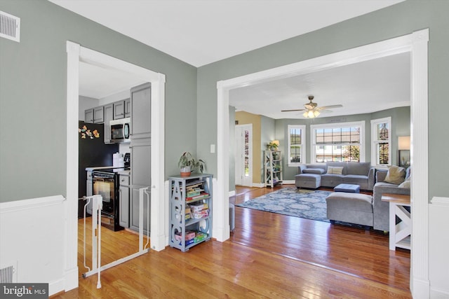 1664 Beech Ln, Hanover, PA 17331 - living room with visible vents, baseboards, ceiling fan, and wood finished floors