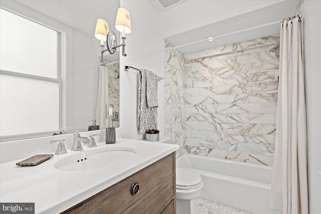 full bathroom with tile patterned flooring, shower / tub combo, toilet, and vanity