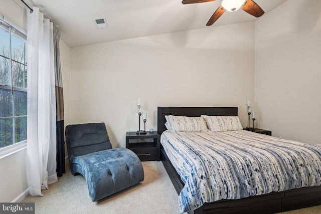 bedroom with carpet floors, baseboards, and ceiling fan