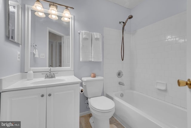 full bathroom with toilet,  shower combination, and vanity