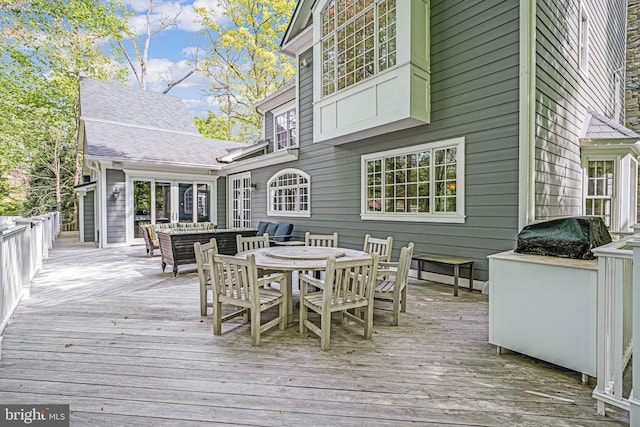 6020 Copely Ln, Mclean, VA 22101 - wooden deck with area for grilling, outdoor lounge area, and outdoor dining area