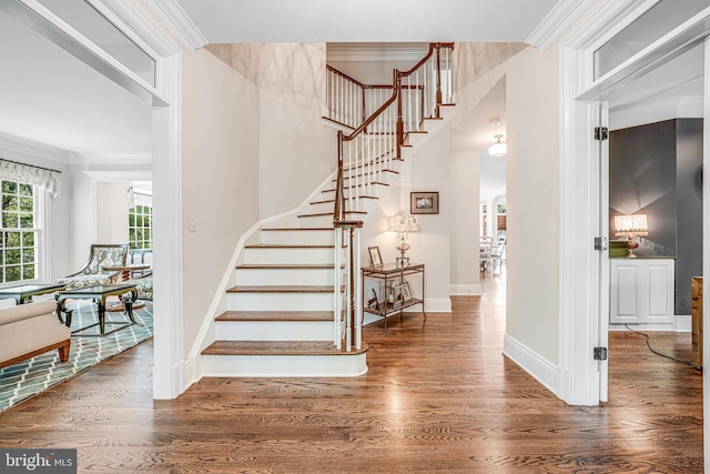 6020 Copely Ln, Mclean, VA 22101 - staircase featuring crown molding, baseboards, and wood finished floors