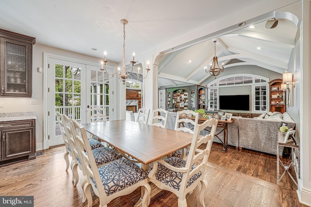 6020 Copely Ln, Mclean, VA 22101 - dining room featuring lofted ceiling with beams, light wood finished floors, a chandelier, french doors, and recessed lighting