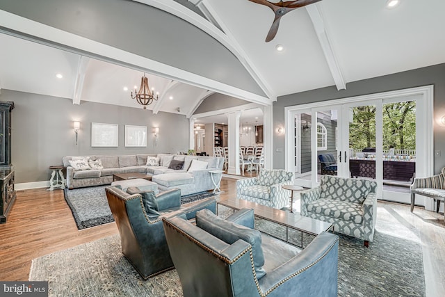 6020 Copely Ln, Mclean, VA 22101 - living area with decorative columns, wood finished floors, baseboards, lofted ceiling with beams, and ceiling fan with notable chandelier