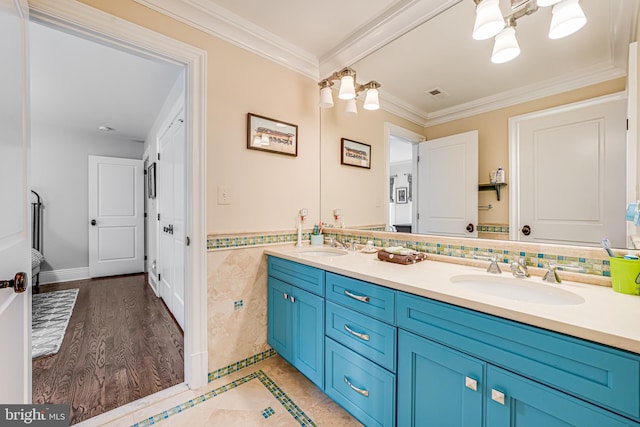 6020 Copely Ln, Mclean, VA 22101 - full bathroom featuring crown molding, double vanity, tile walls, and a sink