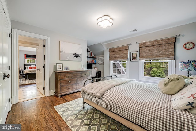 6020 Copely Ln, Mclean, VA 22101 - bedroom featuring visible vents and dark wood-style floors
