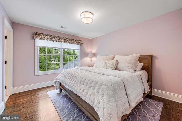 6020 Copely Ln, Mclean, VA 22101 - bedroom with baseboards, visible vents, and wood finished floors