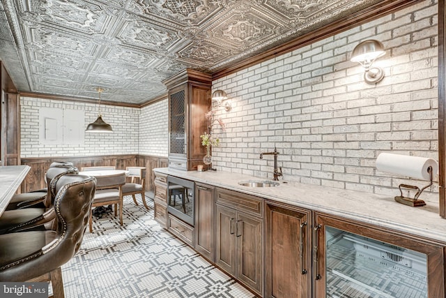 6020 Copely Ln, Mclean, VA 22101 - kitchen with light countertops, stainless steel microwave, a sink, and an ornate ceiling