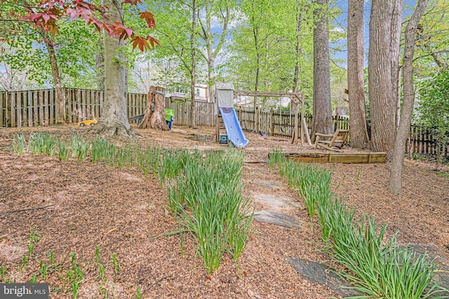 6020 Copely Ln, Mclean, VA 22101 - view of yard with a fenced backyard and a playground
