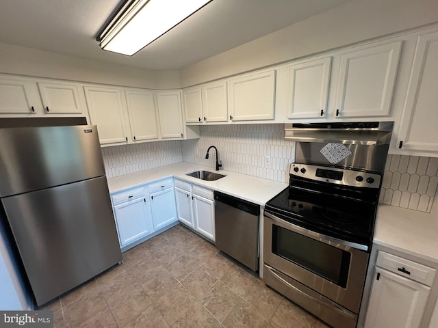 713 Garnet Dr, Burlington, NJ 08016 - kitchen with white cabinets, appliances with stainless steel finishes, a sink, and light countertops
