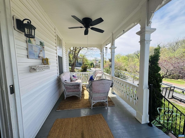 view of patio / terrace featuring a ceiling fan and covered porch