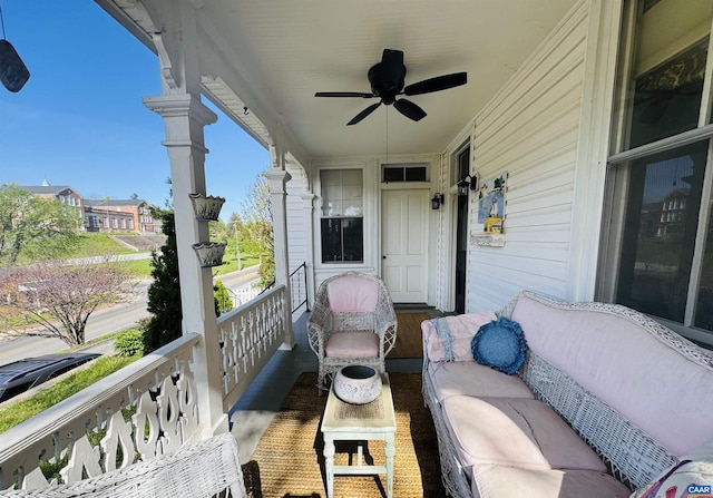exterior space with a porch, ceiling fan, and an outdoor living space