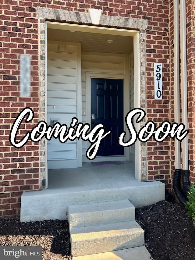 5910 Etterbeek St, Ijamsville, MD 21754 - doorway to property with brick siding