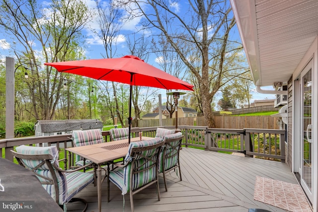2411 Nickoles Dr, Sykesville, MD 21784 - wooden terrace with fence, an outdoor structure, and outdoor dining area