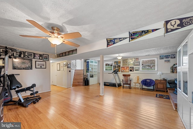 2411 Nickoles Dr, Sykesville, MD 21784 - exercise area featuring wood finished floors and a textured ceiling