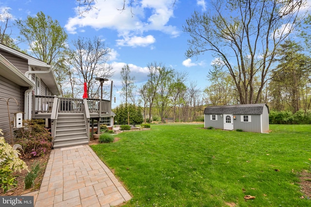 2411 Nickoles Dr, Sykesville, MD 21784 - view of yard featuring an outdoor structure, stairs, and a deck