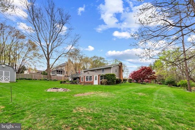 2411 Nickoles Dr, Sykesville, MD 21784 - view of yard with fence, an outbuilding, and a storage shed