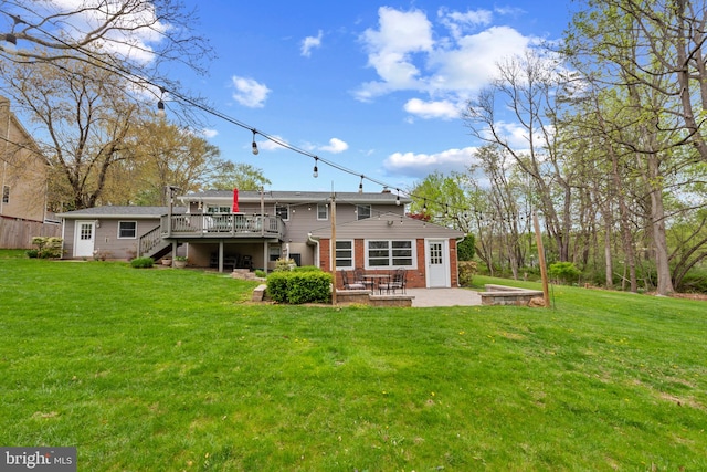 2411 Nickoles Dr, Sykesville, MD 21784 - rear view of house with a lawn, a wooden deck, stairway, and a patio