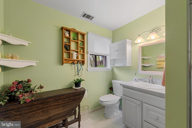 2411 Nickoles Dr, Sykesville, MD 21784 - bathroom featuring tile patterned floors, visible vents, toilet, vanity, and baseboards