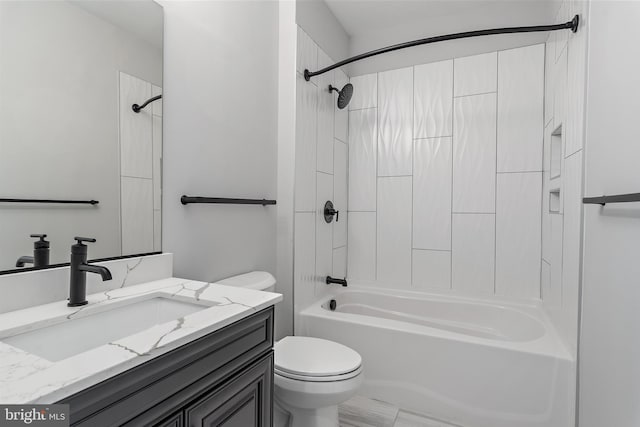 full bath featuring toilet, shower / bath combination, and vanity