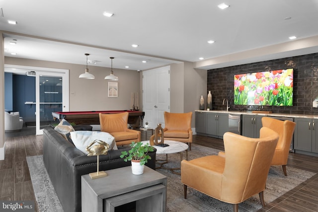 living room with billiards, dark wood-style flooring, recessed lighting, and wet bar