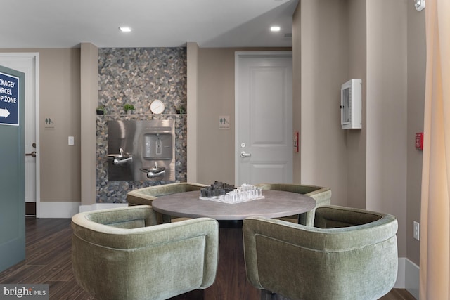 dining area featuring recessed lighting and dark wood-type flooring