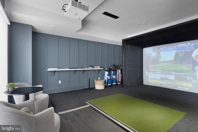 recreation room featuring carpet flooring and golf simulator